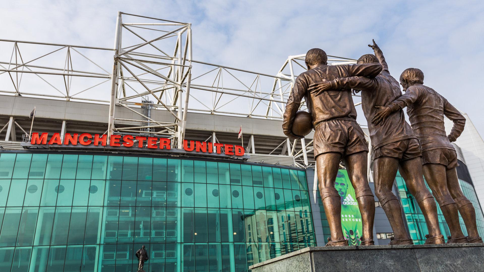 Ilustrasi Tezos sponsori seragam latihan Manchester United